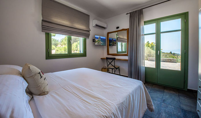 Ground floor bedroom opening onto the terrace, Villa Phoenix, Skopelos