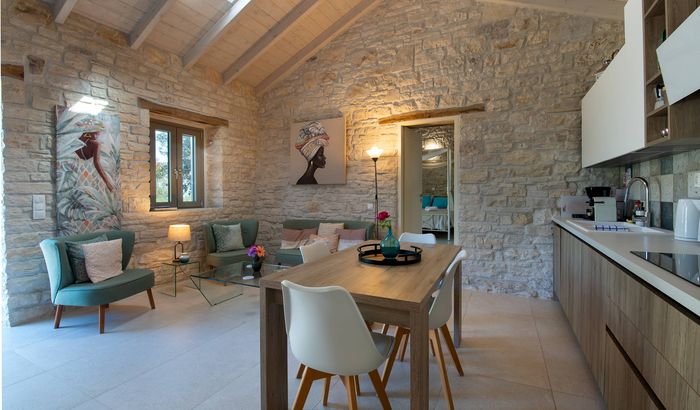 Open-plan living room with dining area and kitchen, Apollo's Retreat, Paxos, Greece