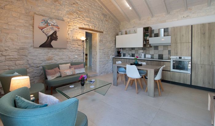 Open-plan living room with dining area and kitchen, Apollo's Retreat, Paxos, Greece