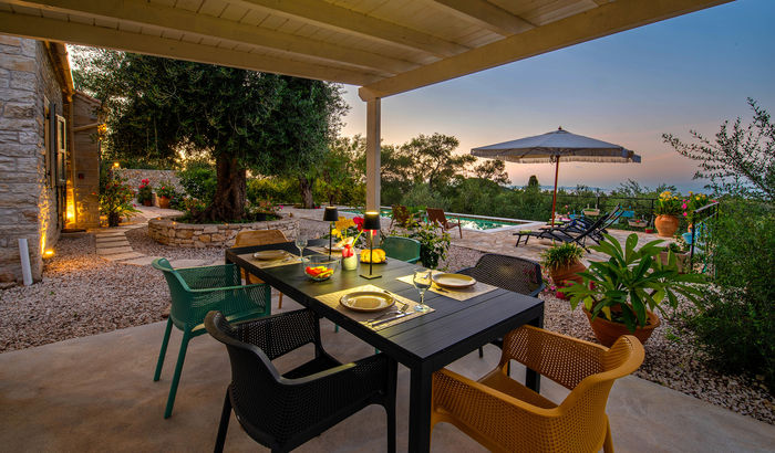 Sunset at Apollo's Retreat, pergola and terrace, Paxos, Greece