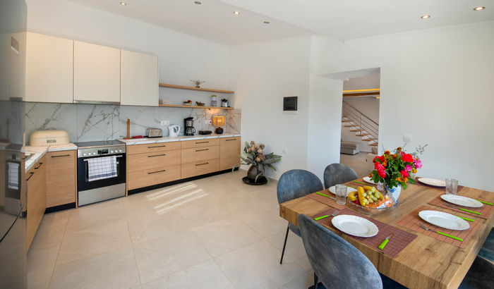 Open-plan living room and kitchenette, Nassos House, Paxos, Greece